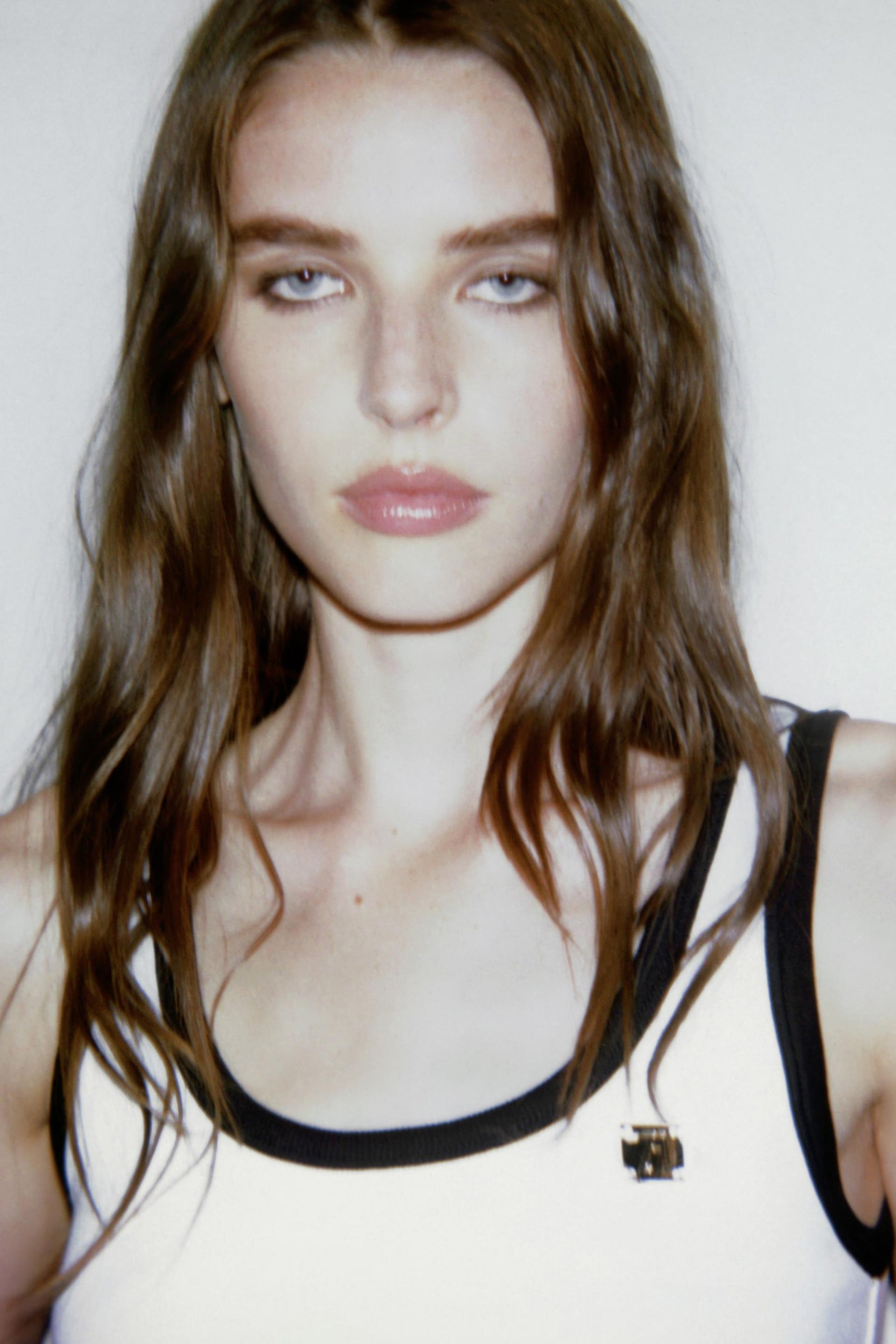 Contrast-Trimmed Brooch-Accented Top