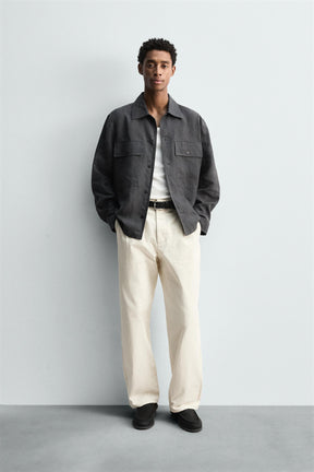PLEATED HERRINGBONE TROUSERS - Image 1