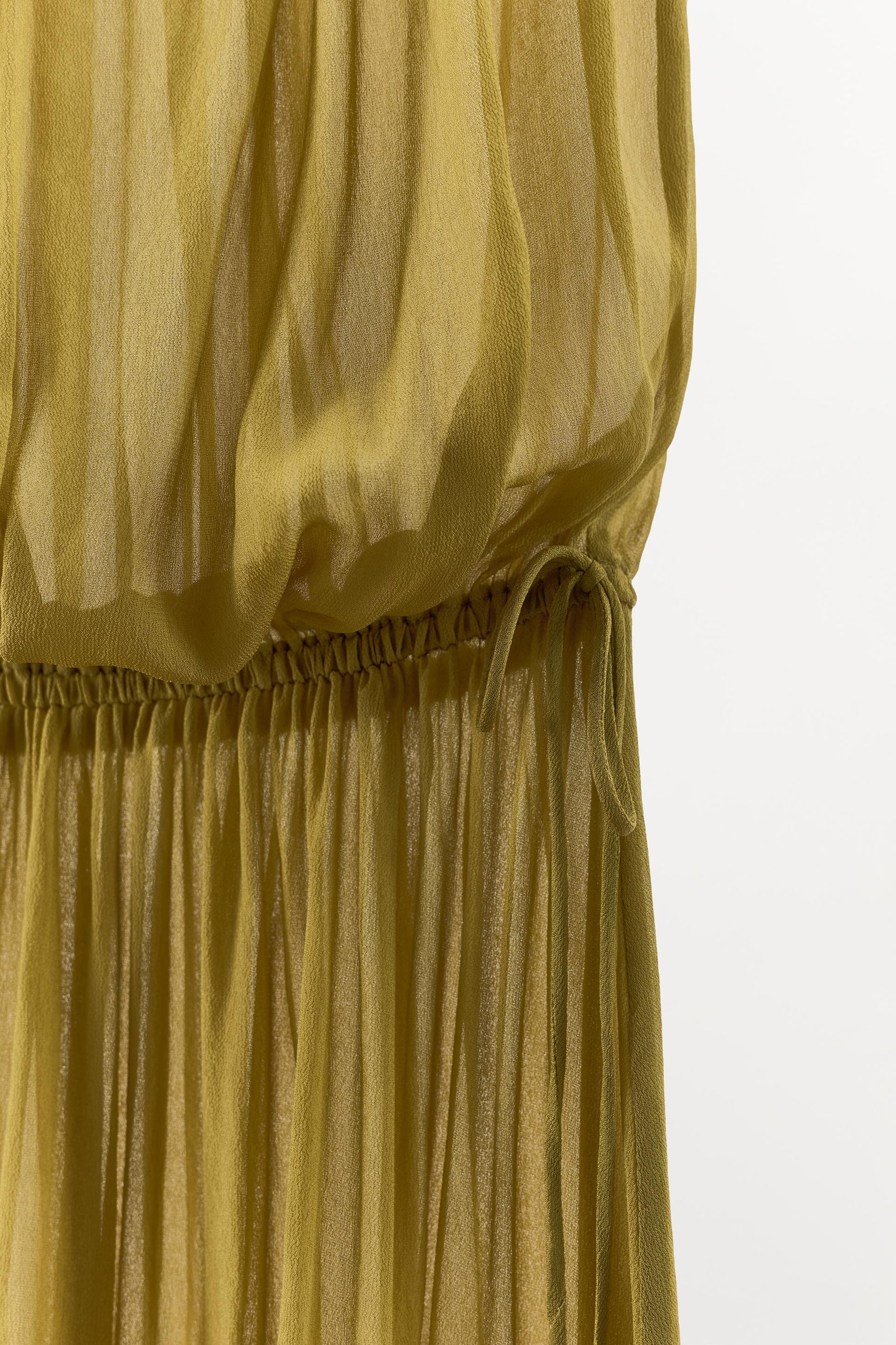 Asymmetric Tie-Accented Top