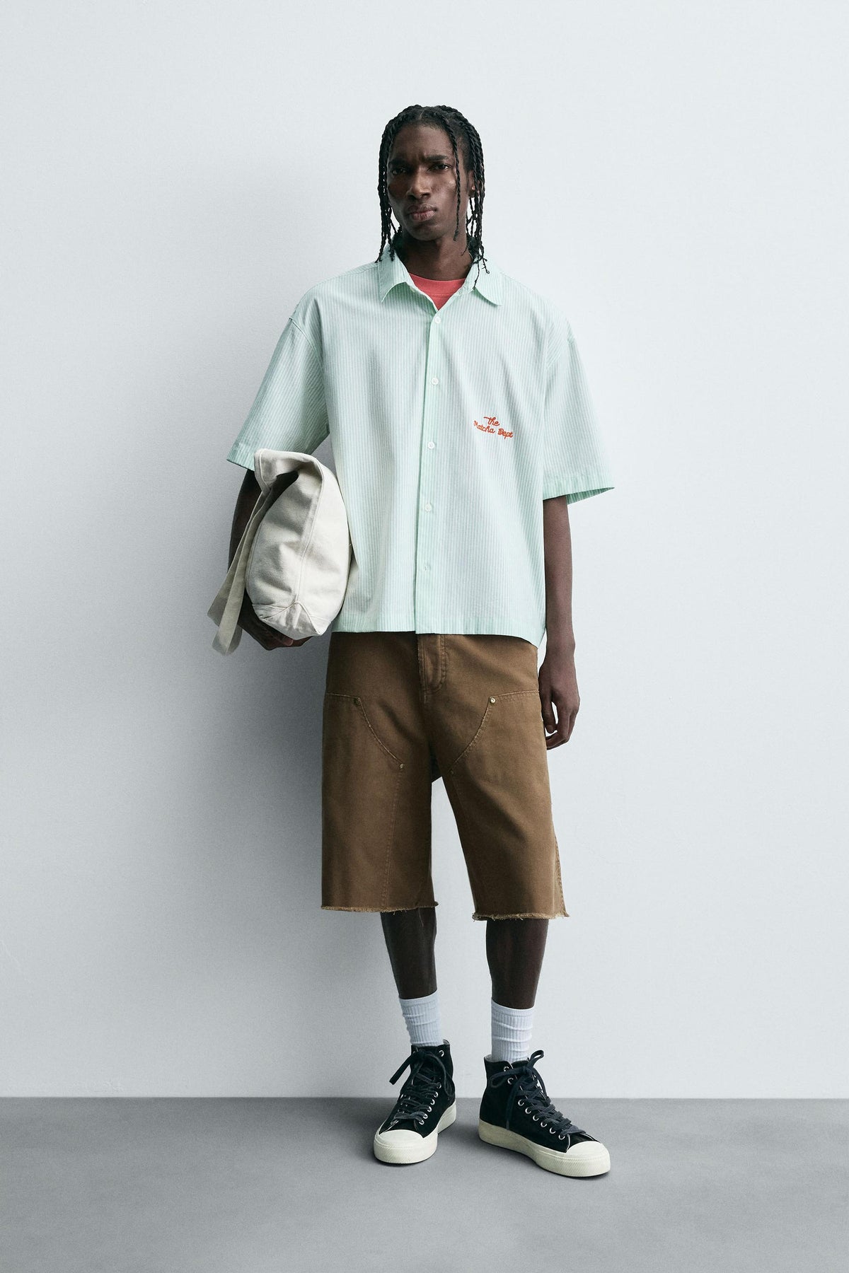 STRIPED SHIRT WITH CONTRAST SLOGAN - Image 1