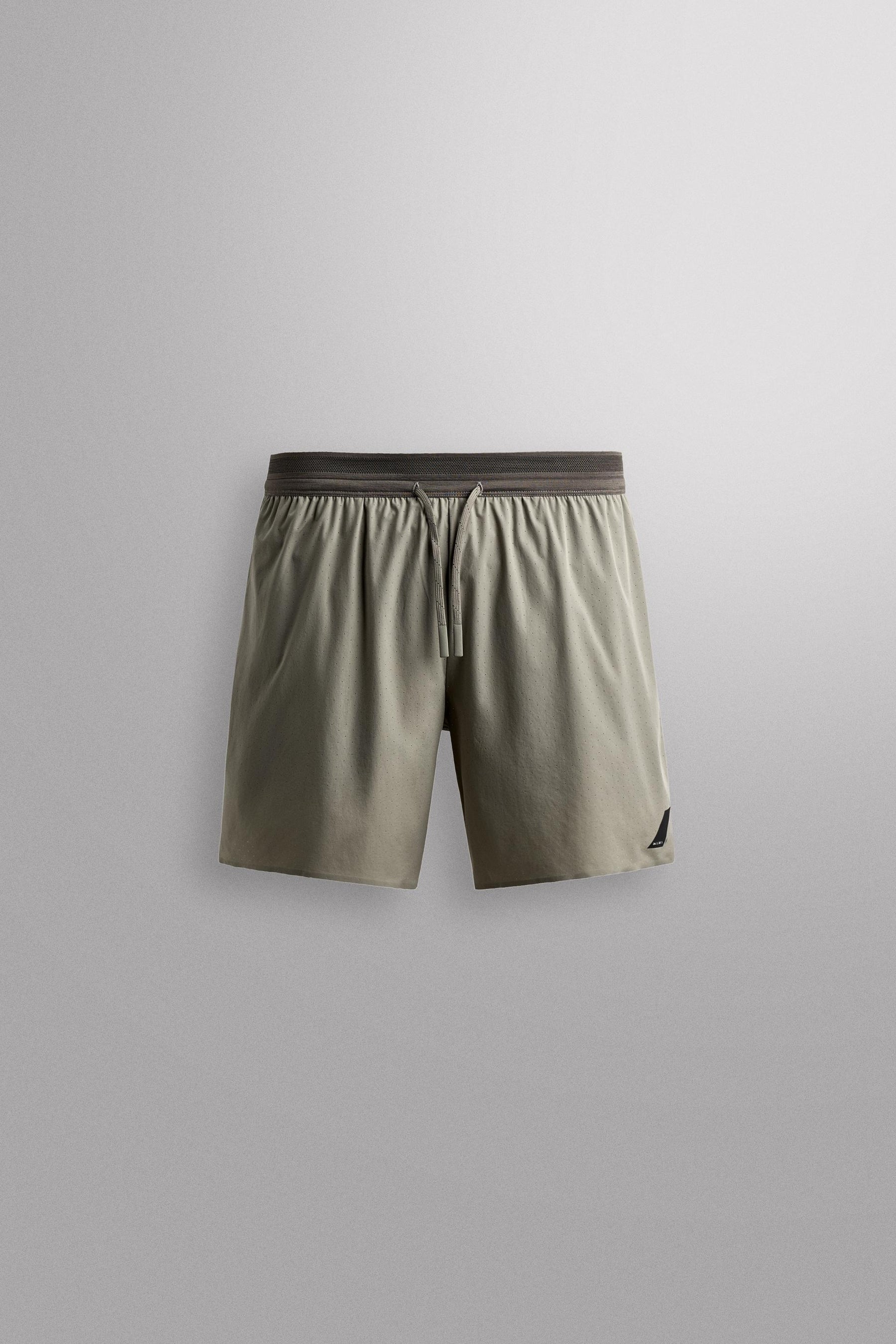 LIGHTWEIGHT PERFORATED SHORTS - Image 7