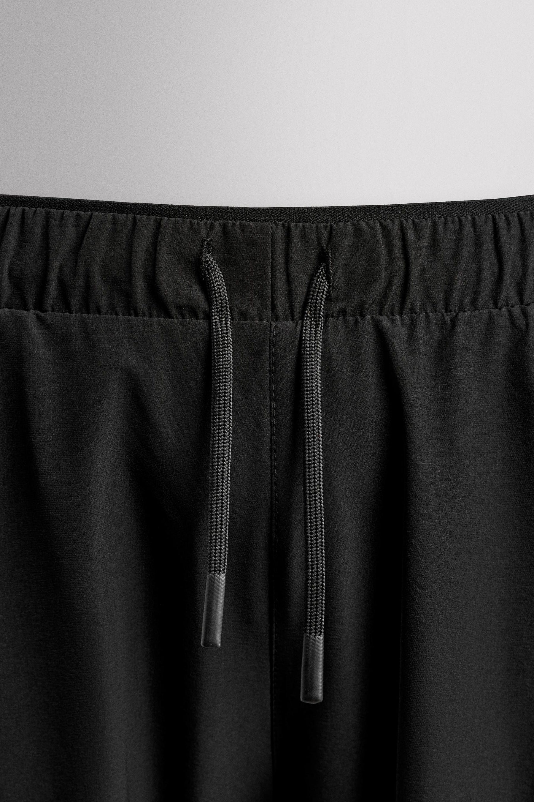 LIGHTWEIGHT TECHNICAL TROUSERS - Image 9