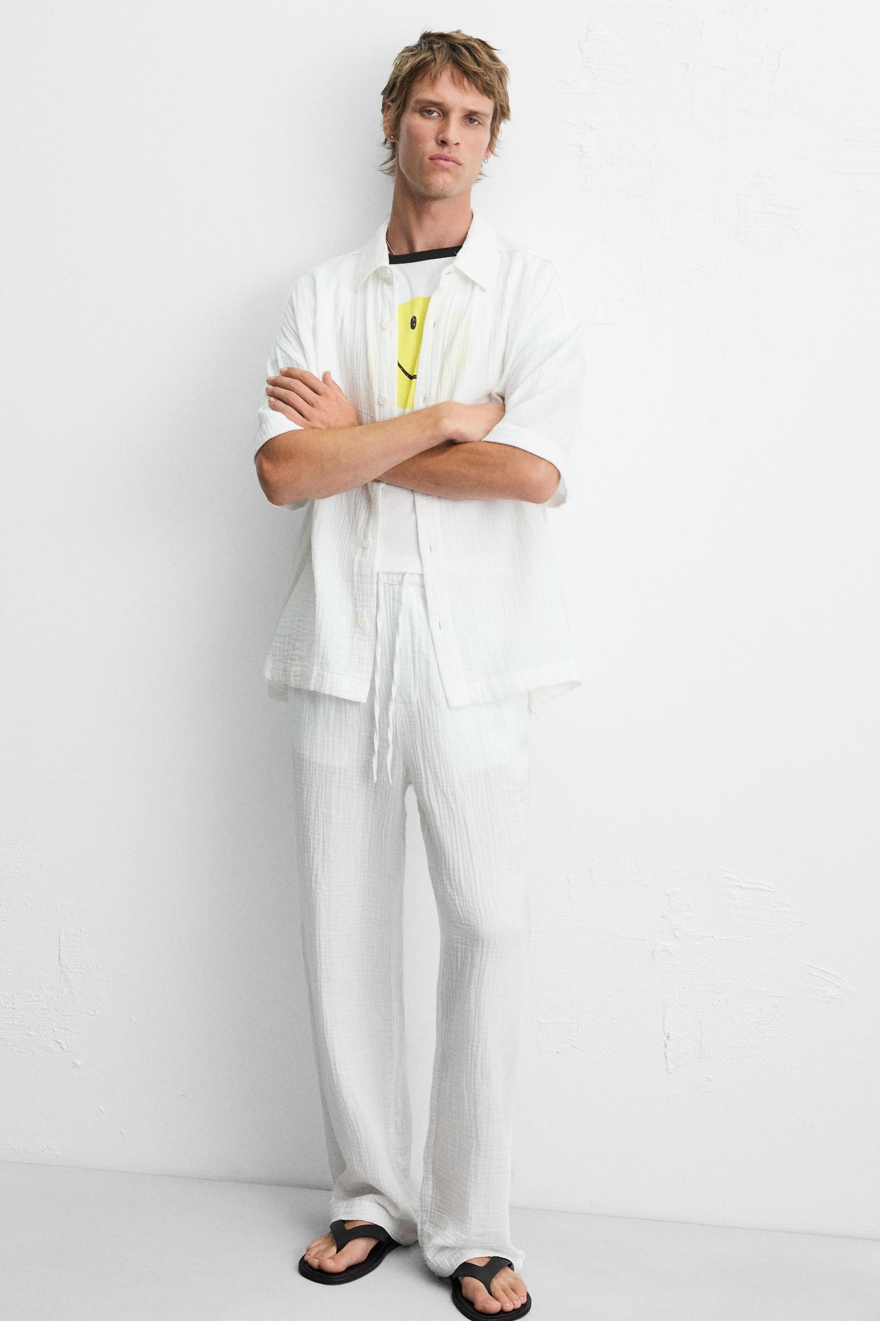 CRINKLED-EFFECT TROUSERS - Image 6