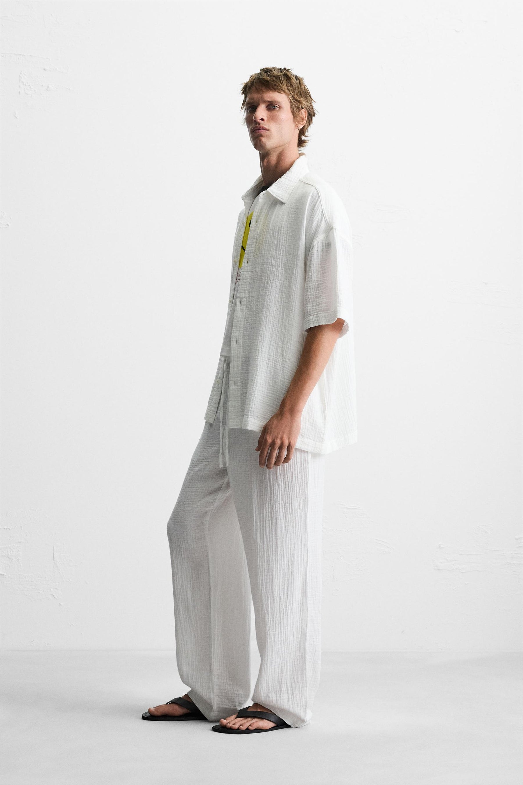 CRINKLED-EFFECT TROUSERS - Image 4