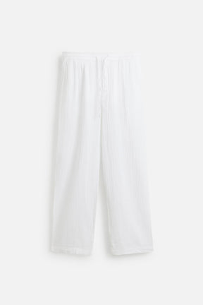 CRINKLED-EFFECT TROUSERS - Image 7