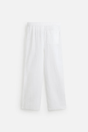 CRINKLED-EFFECT TROUSERS - Image 8