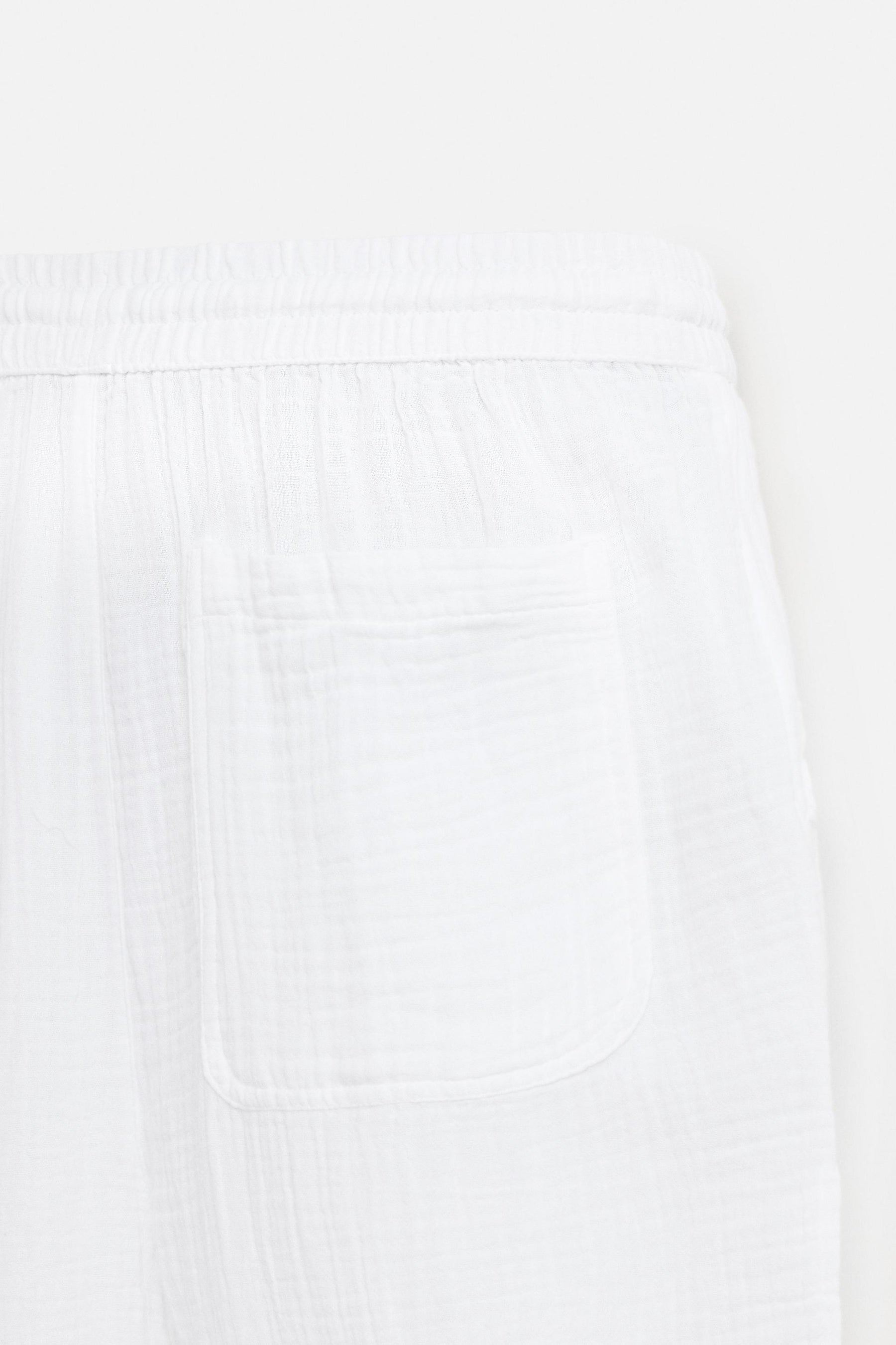 CRINKLED-EFFECT TROUSERS - Image 10