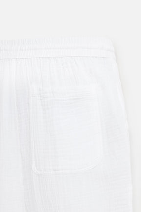 CRINKLED-EFFECT TROUSERS - Image 10