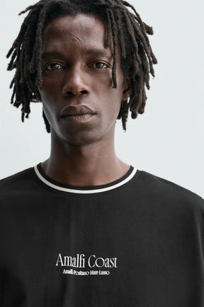 T-SHIRT WITH RAISED SLOGAN PRINTS - Image 4