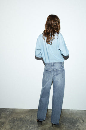 Cropped jeans with displaced