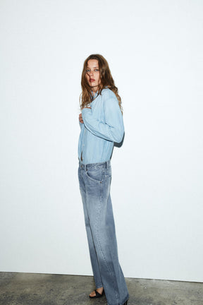 Cropped jeans with displaced
