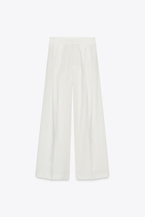 PLEATED TROUSERS WITH FLAPS