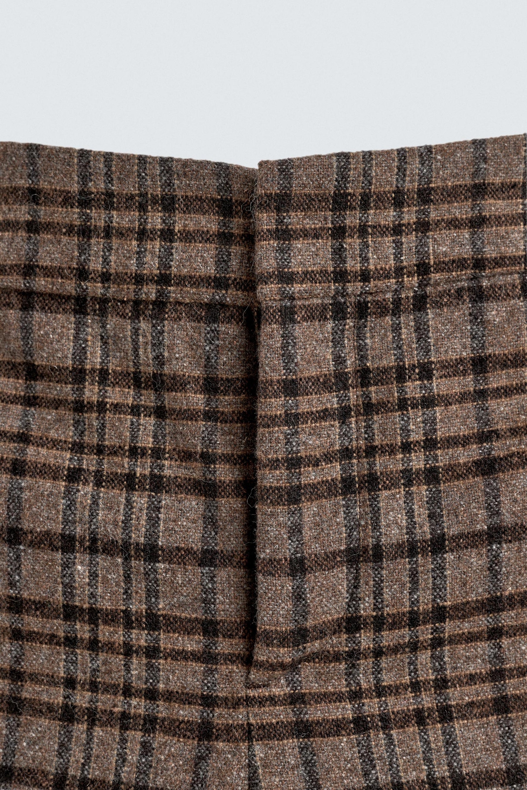 CHECKED FLARE TROUSERS