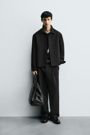 RELAXED FIT PLEATED TROUSERS - Image 1