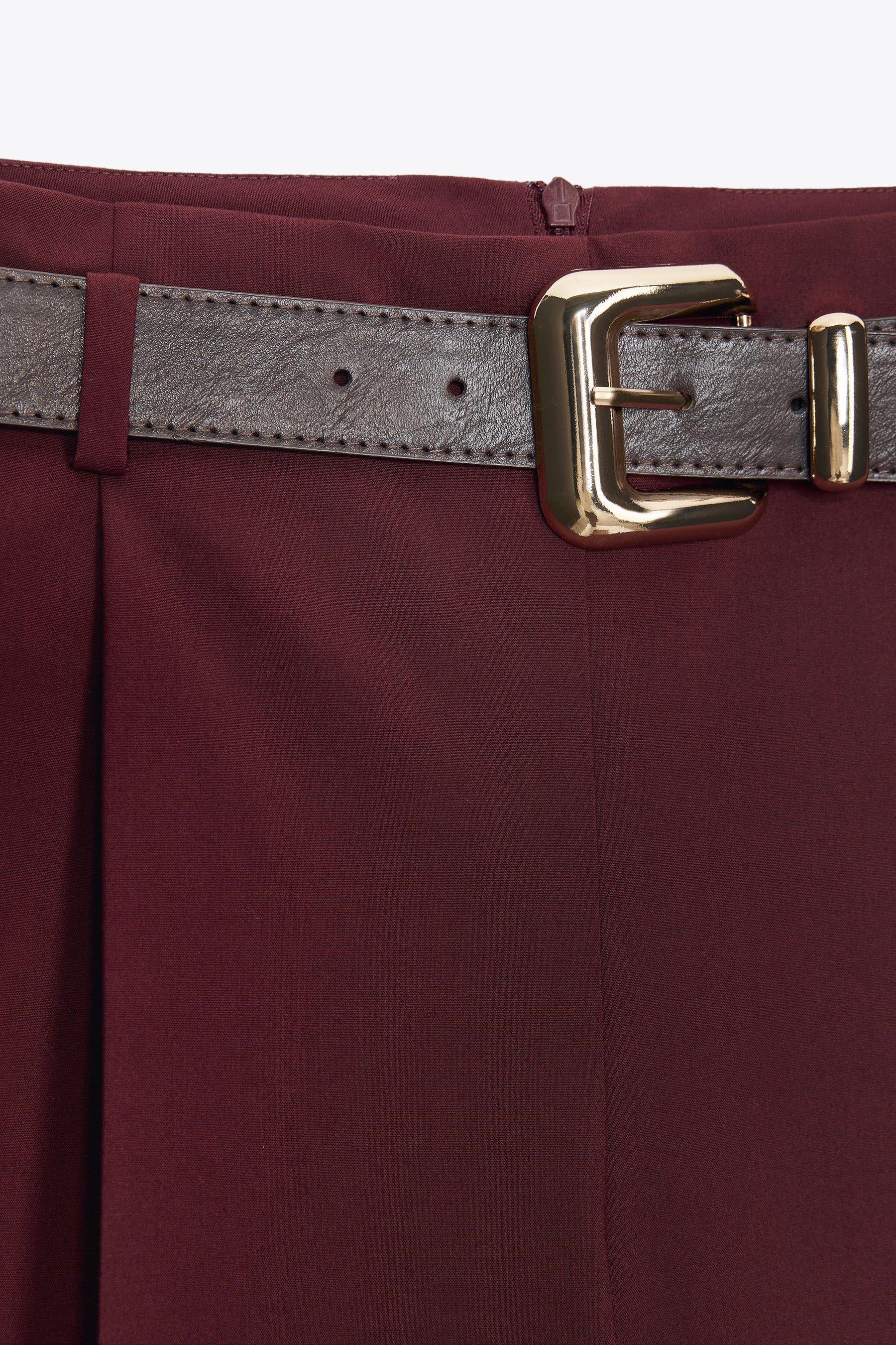 Trousers with belt