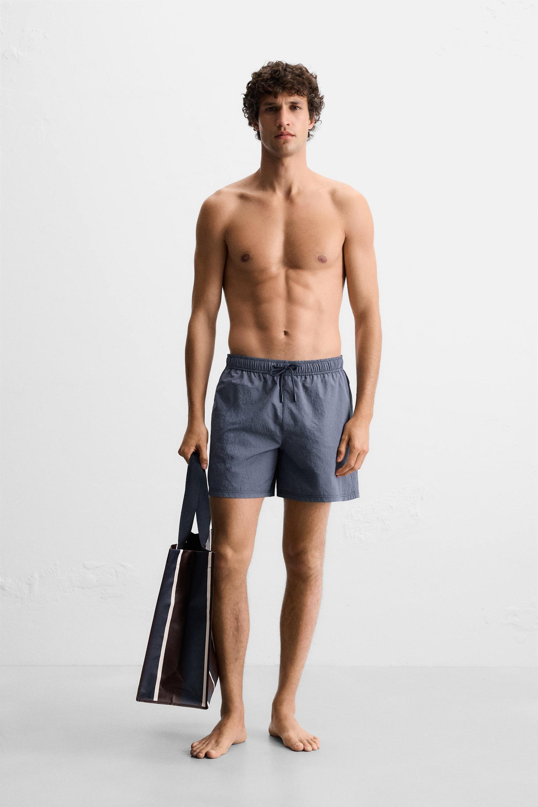 STRIPED MID-LENGTH SWIMMING TRUNKS - Image 1
