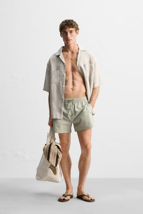 SEERSUCKER MID-LENGTH SWIMMING TRUNKS - Image 1