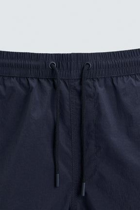 BASIC MID-LENGTH SWIMMING TRUNKS - Image 8