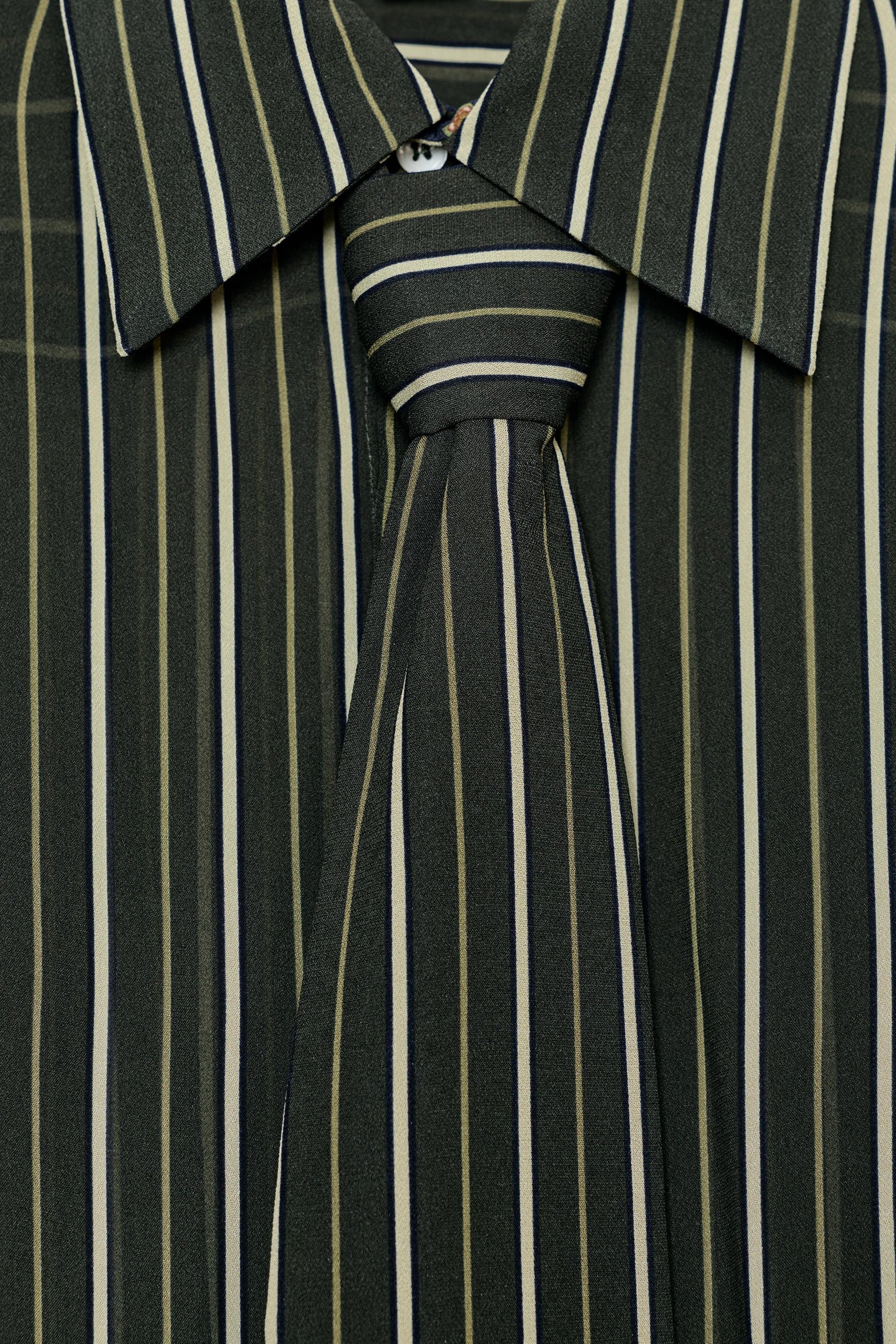 Striped flowing tie-neck shirt