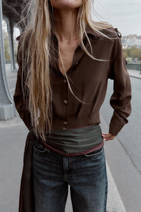 Shirt with shoulder tabs