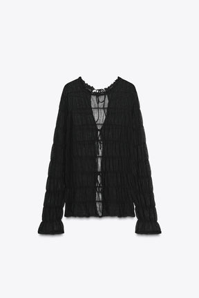 Semi-sheer knit blouse
