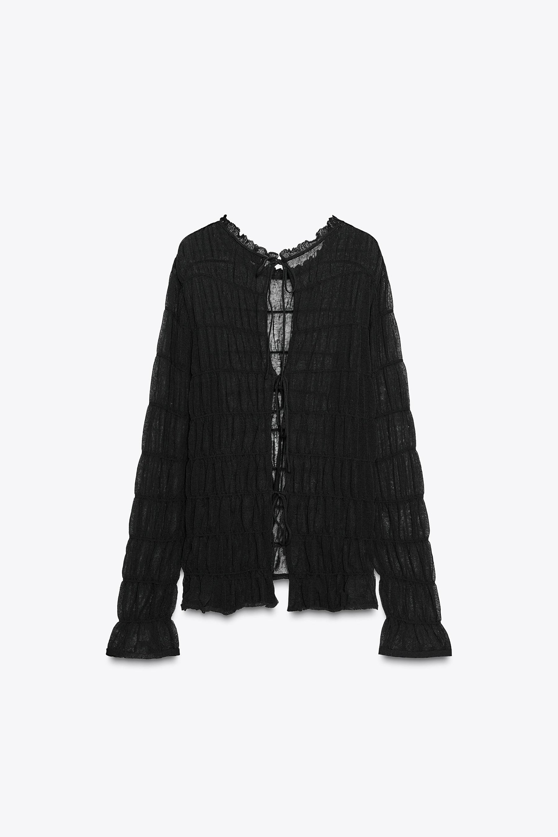 Semi-sheer knit blouse