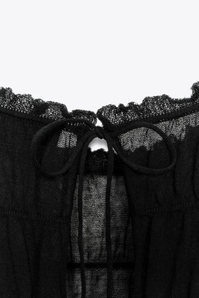 Semi-sheer knit blouse