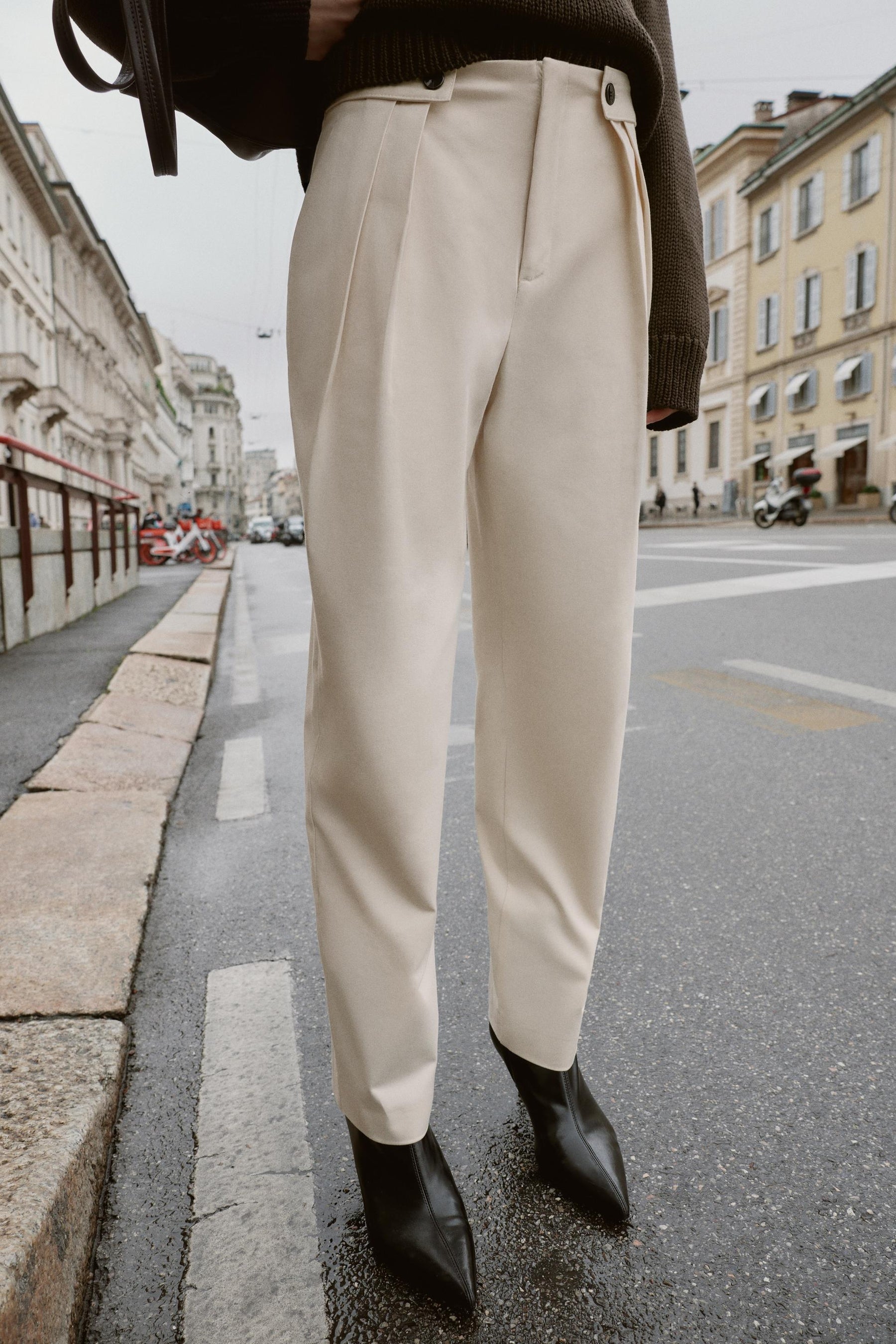 Trousers with button waist