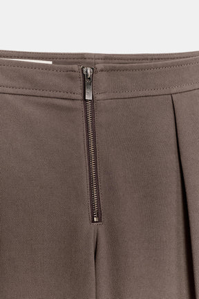 Zip-up Carrot Trousers