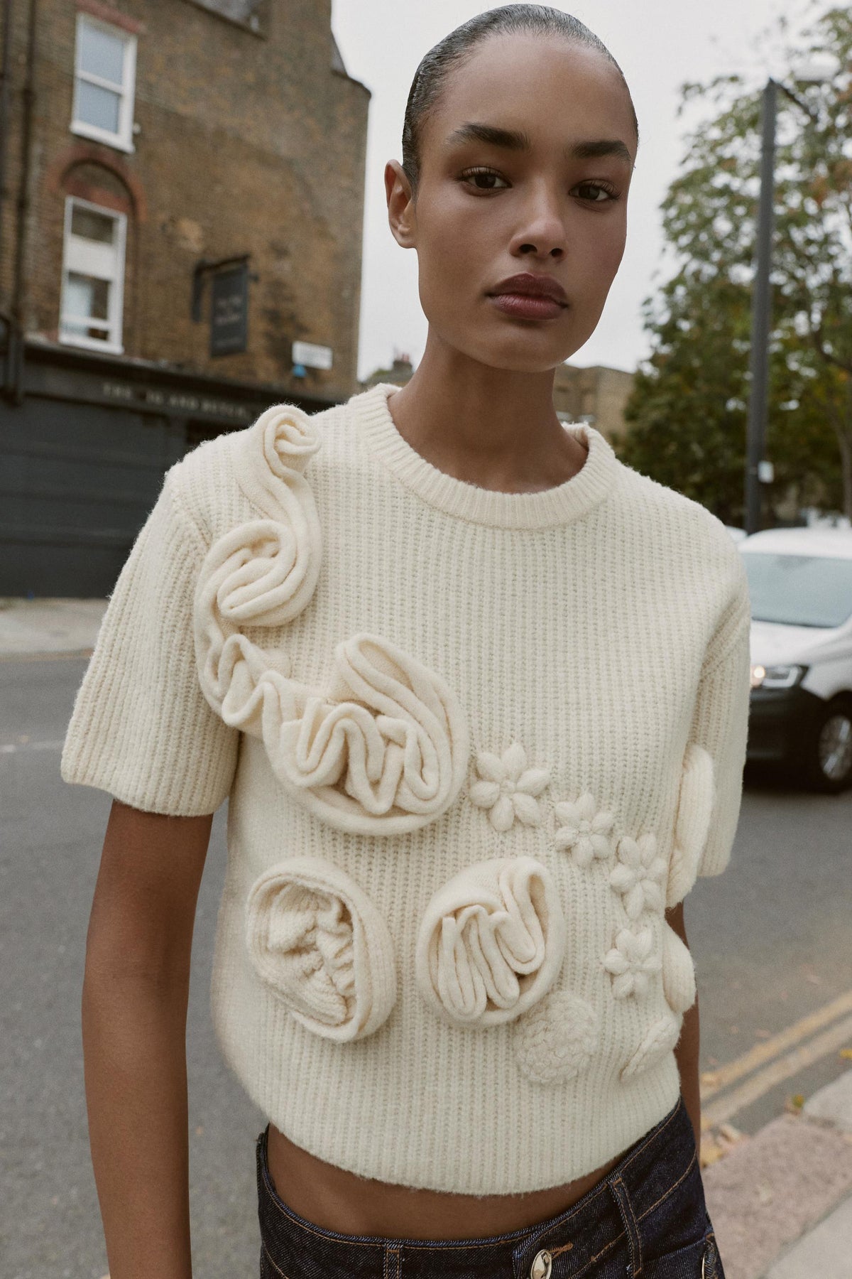 TEXTURED FLORAL JUMPER