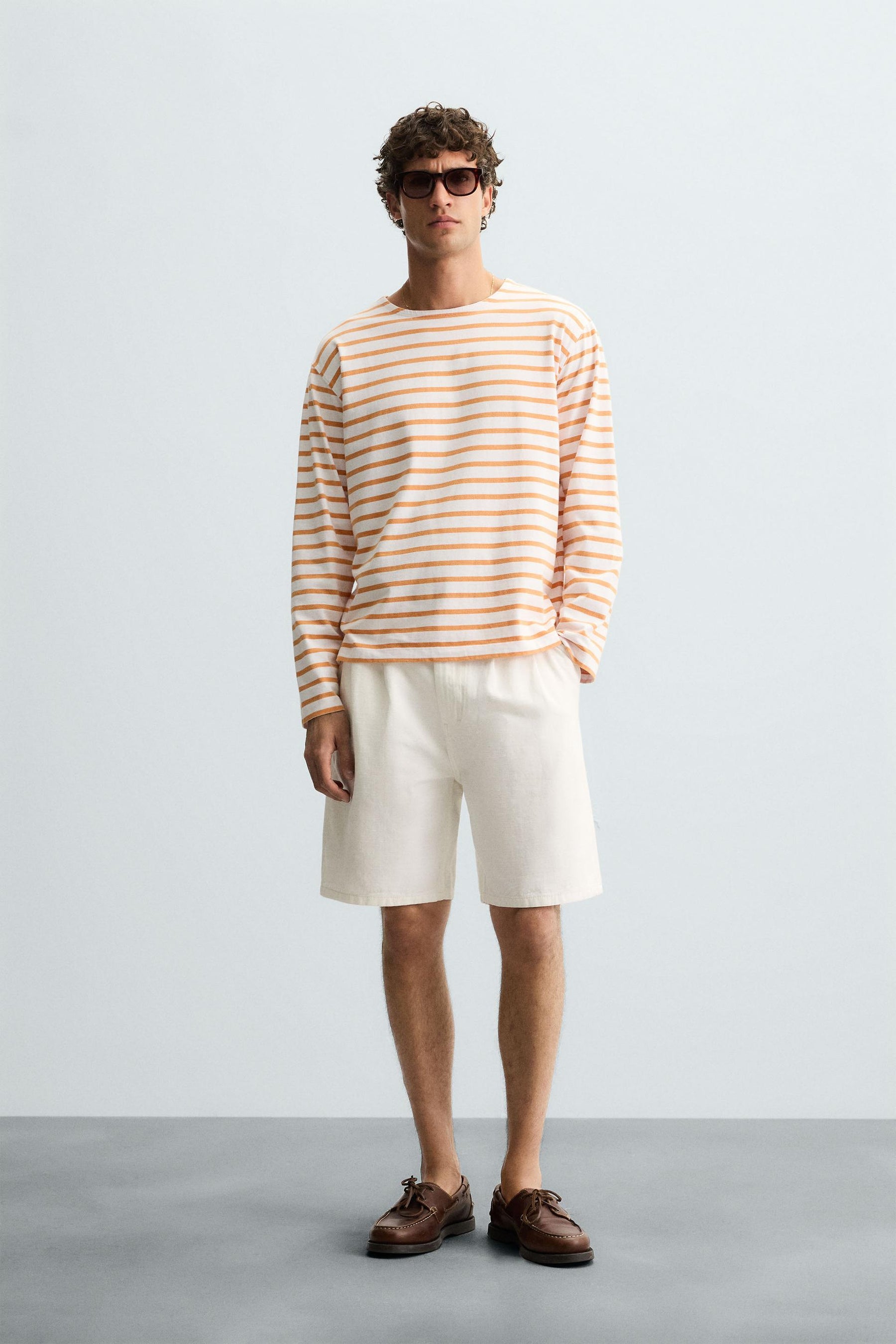 PLEATED RELAXED FIT BERMUDA SHORTS - Image 1