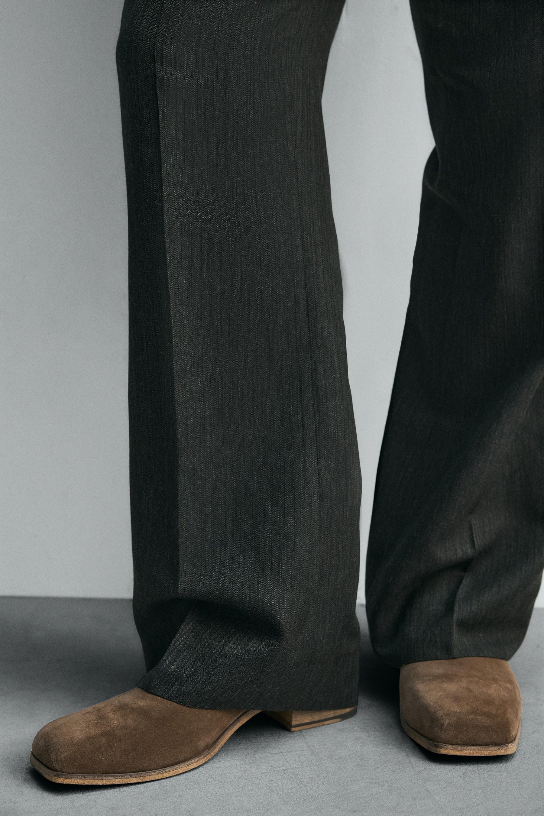 LEATHER HEELED LIMITED EDITION BOOTS - Image 1