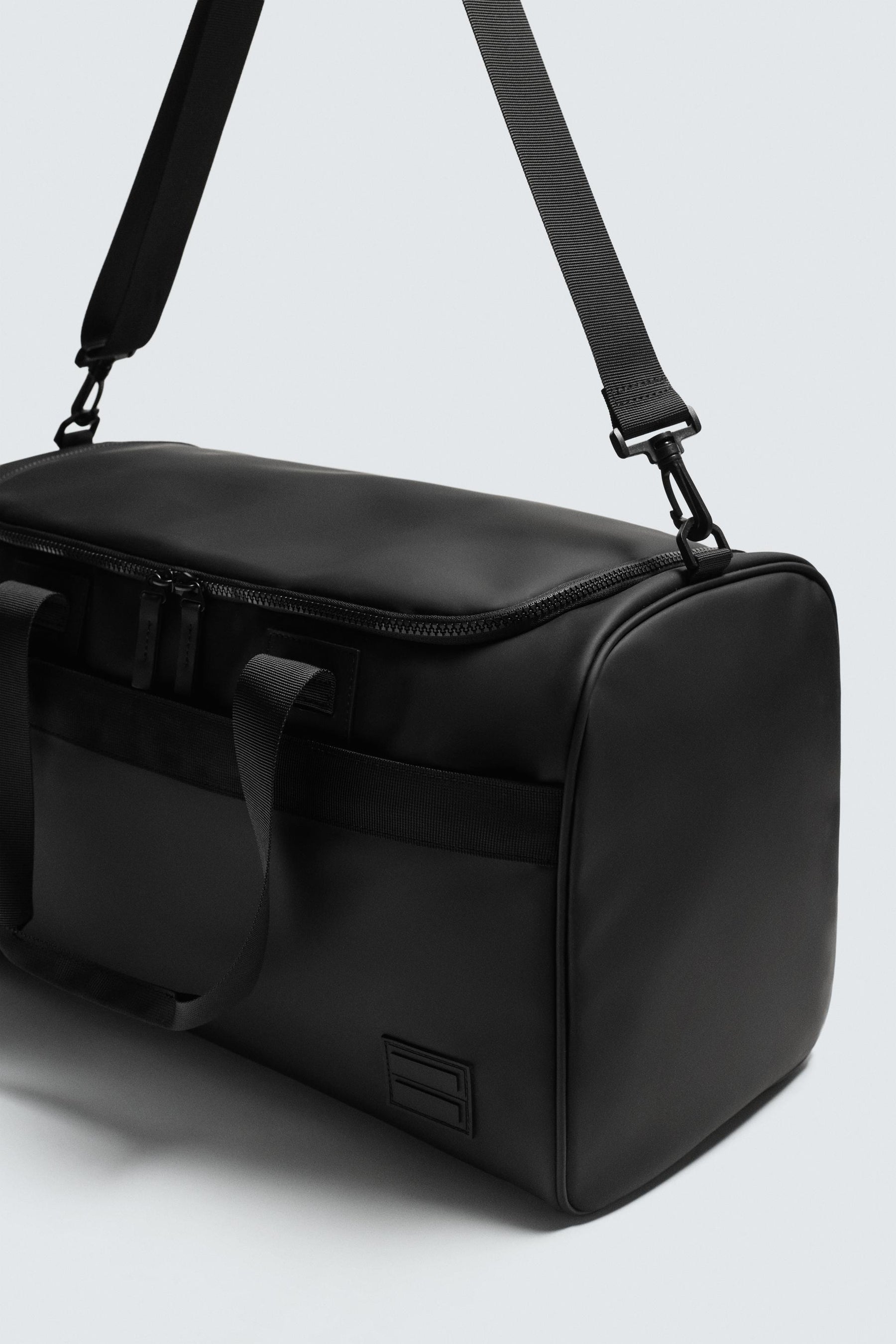 RUBBERISED TRAVEL BAG