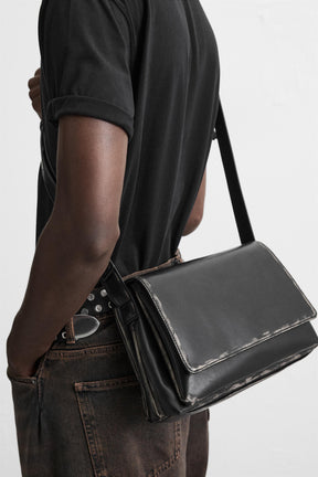 DISTRESSED-EFFECT FLAP CROSSBODY BAG