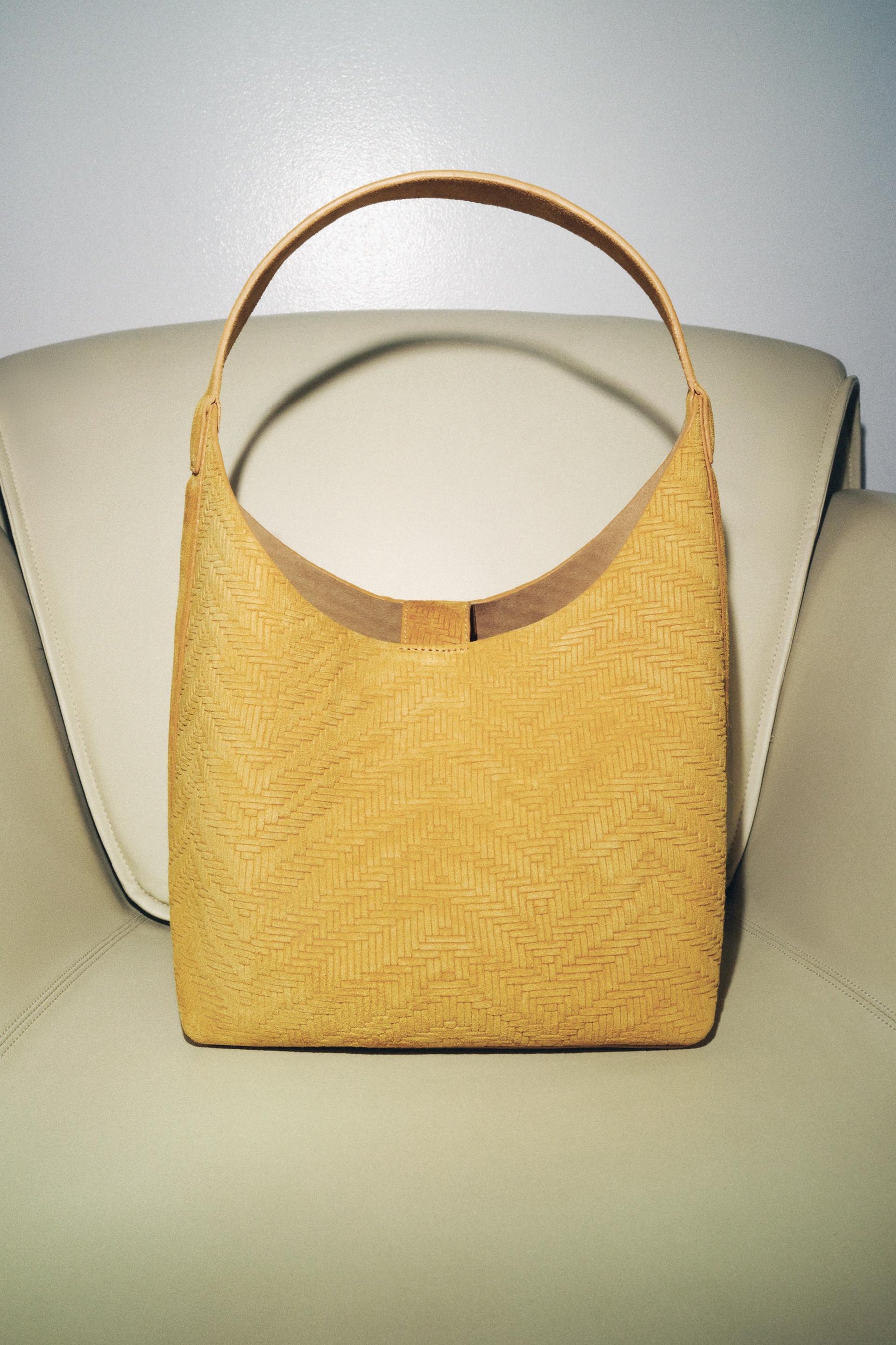 BRAIDED SUEDE LEATHER BAG